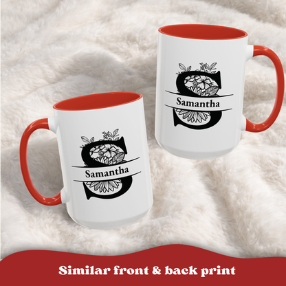 Two white ceramic mugs with red interiors and handles are shown on a soft white faux-fur surface. Each mug has a black floral monogram design with the name 'Samantha' printed in the center. Similar front & back print.