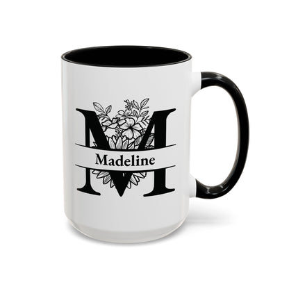 Mug with a large personalizable monogram initial and name on top, in black, right handle view. Mug is placed on a white background