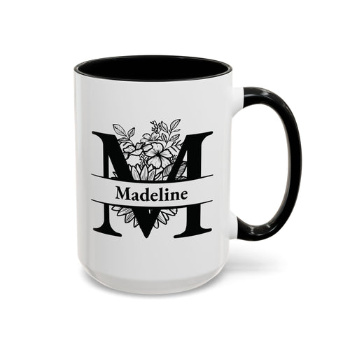 Mug with a large personalizable monogram initial and name on top, in black, right handle view. Mug is placed on a white background