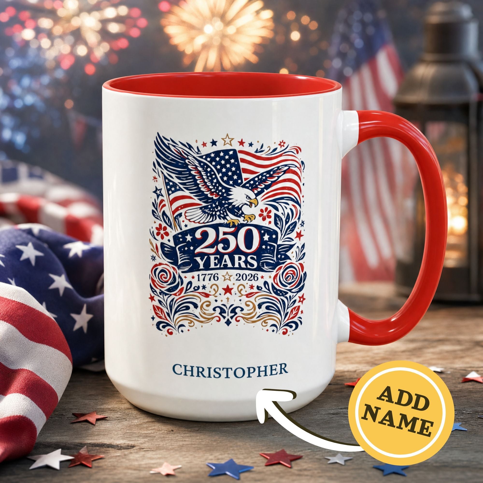 Mug with American flag design and '250 Years' text, featuring a red handle, on a wooden surface with American flags and fireworks in the background.