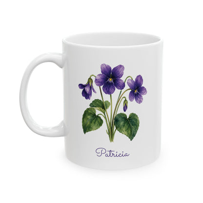A white ceramic 11oz mug featuring a watercolor-style illustration of purple violins with green leaves and the name 'Patricia' printed below in purple script, shown on a clean white background.