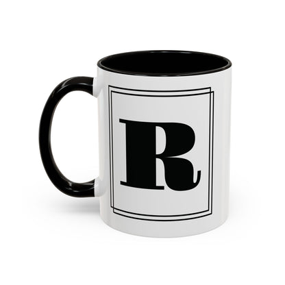 Personalized block letter monogram mug in black, 11oz left side view, letter framed by a double-line border.