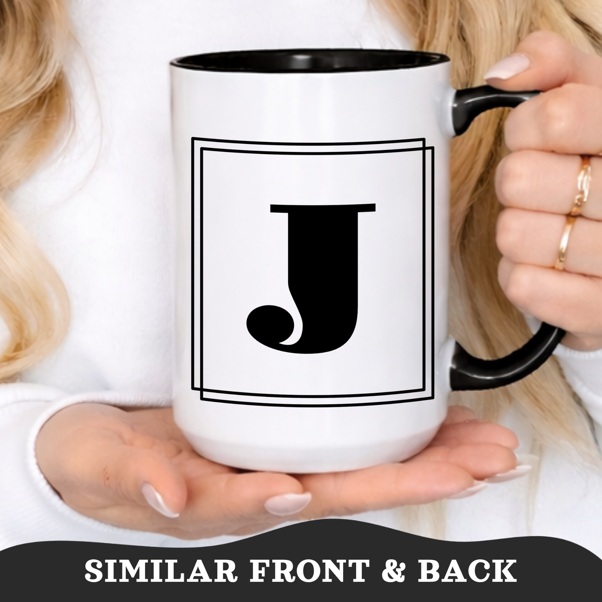 Person holding a personalized 15oz block letter monogram mug in black, showing the bold initial design.