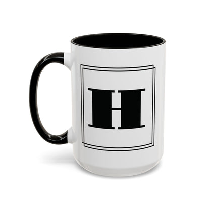 Personalized block letter monogram mug in black, 15oz left side view, letter framed by a double-line border.