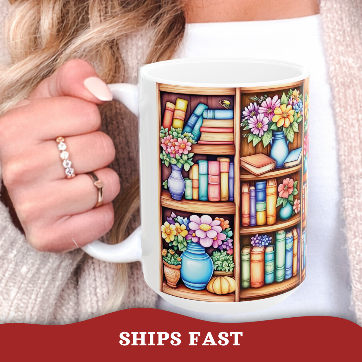 A white ceramic mug featuring a colorful illustration of bookshelves filled with books and flowers, held by a person wearing a cream knit sweater. A red banner at the bottom reads 'SHIPS FAST'.
