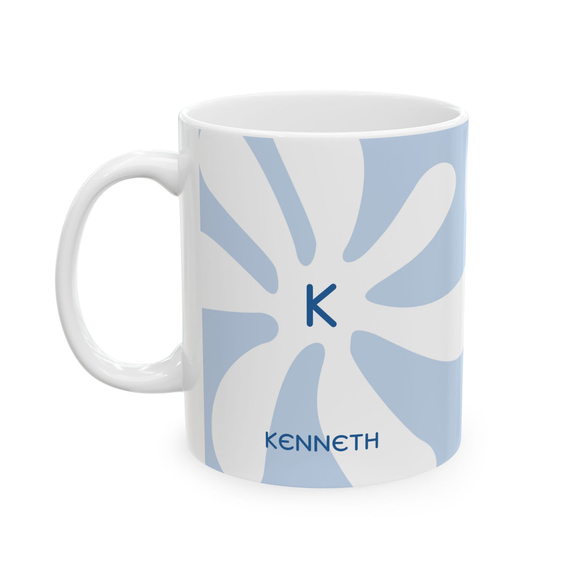 A white ceramic 11oz mug featuring a light blue retro sunburst pattern, a navy blue monogram letter 'K' in the center, and the name 'KENNETH' printed in navy blue at the bottom. Left handle view.