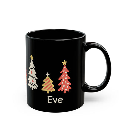 A black ceramic 11oz mug with a handle, decorated with seven colorful Christmas trees around the mug and the name 'Eve' in warm white text, shown on a plain white background. Right handle view.