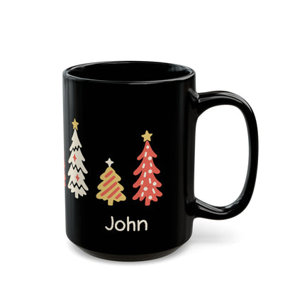 A black ceramic 15oz mug with a handle, decorated with seven stylized Christmas trees around the mug in white, gold color, and red, and the name 'John' printed in white below them, on a solid white background. Right handle view.