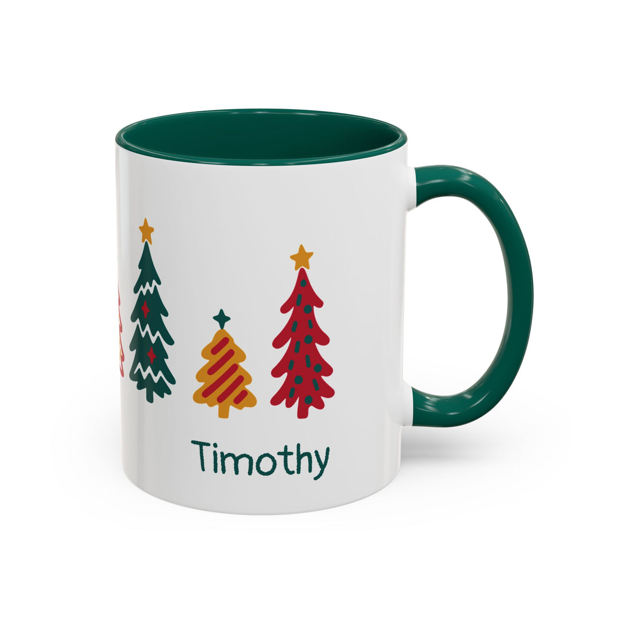 A white ceramic 11oz mug with a dark green handle and interior, featuring a graphic of seven Christmas trees around the mug and the name 'Timothy' printed in dark green text below. Right handle view.