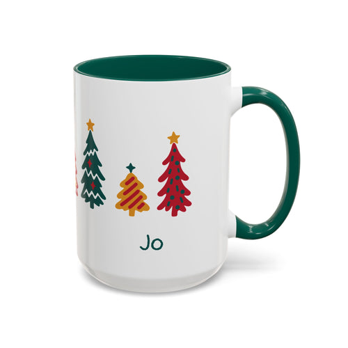 A white ceramic 15oz mug with a dark green handle and interior, decorated with seven colorful Christmas tree illustrations around the mug and the name 'Jo' printed below. Right handle view.