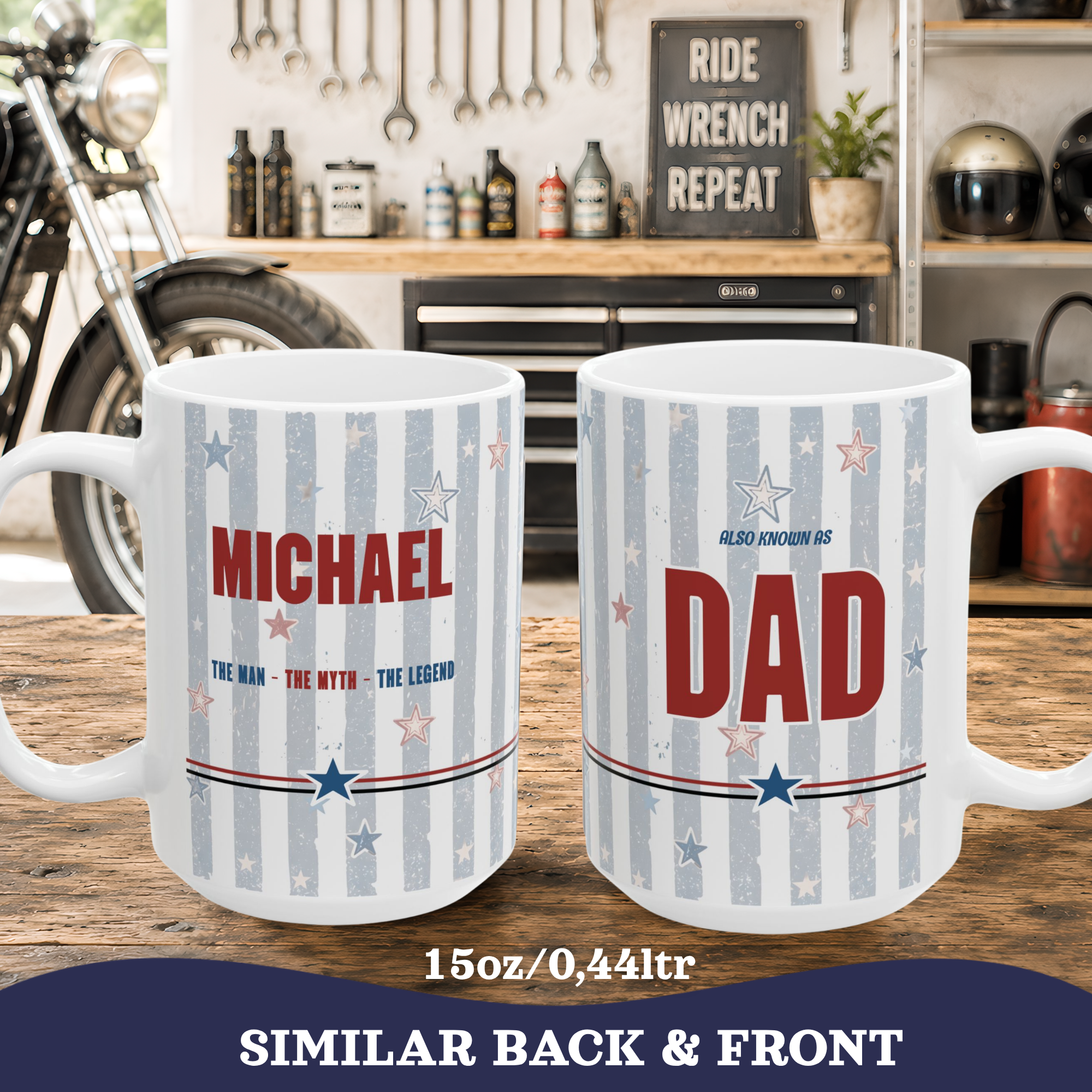 Two white ceramic mugs with patriotic blue and red striped designs are shown side by side on a wooden workbench. The front mug is personalizable with dad's name and the back mug is printed with 'DAD' in red, with smaller blue text above and below.