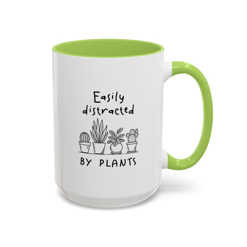 White accent mug with green handle, cacti and succulent line art, 'easily distracted by plants' quote, 15oz right side view.