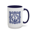 Personalised Easter monogram mug in blue folk art, initial framed by eggs and bunnies