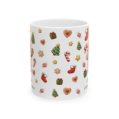 White ceramic 11oz mug with a Christmas pattern of gingerbread cookies, candy canes, stockings, gifts and trees. Handle not visible.