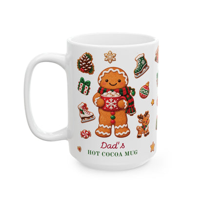 A white ceramic 15oz mug featuring a festive Christmas design with a gingerbread man holding a mug of hot cocoa, surrounded by holiday icons like a pinecone, stocking, and gift. The text 'Dad's HOT COCOA MUG' is printed at the bottom. Left handle view.