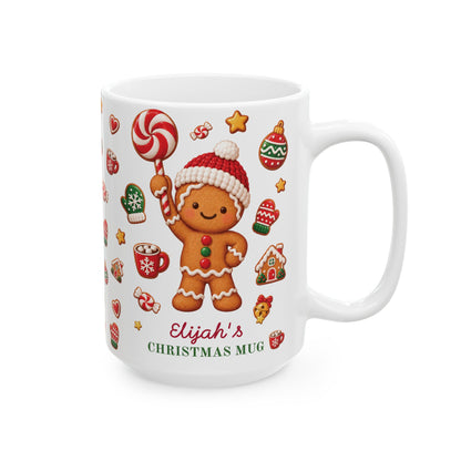 White ceramic 15oz Christmas mug with a gingerbread cookie holding a lollipop and the text 'Elijah's CHRISTMAS MUG'. Right handle view.