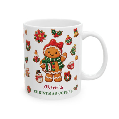 A white ceramic 11oz mug featuring a festive Christmas design with a gingerbread elf character, surrounded by holiday motifs like ornaments, holly, and stars. The text 'Mom's CHRISTMAS COFFEE' is printed on the front. Right handle view.