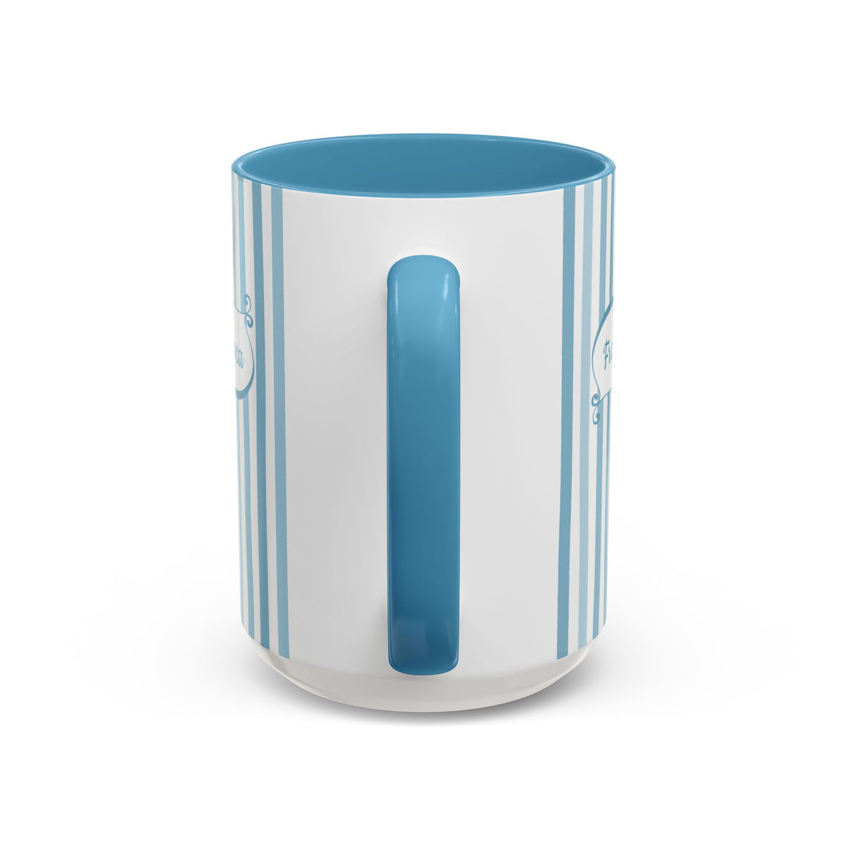 Handle view of a white ceramic 11oz mug with blue interior and handle on a white background.