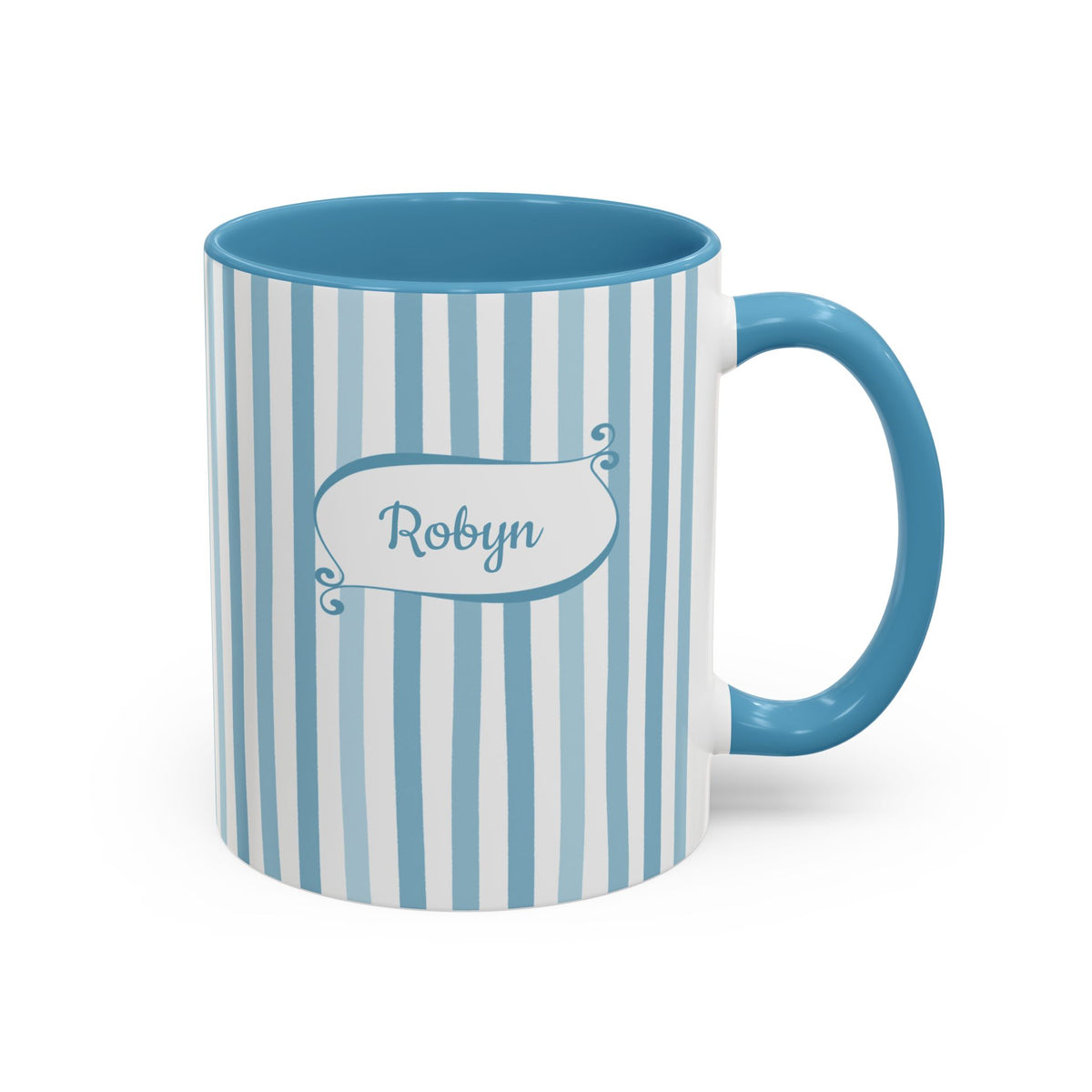A ceramic 11oz mug with vertical light blue and white stripes, a solid blue handle and interior, and a white label on the front that reads 'Robyn' in blue script. Right handle view.