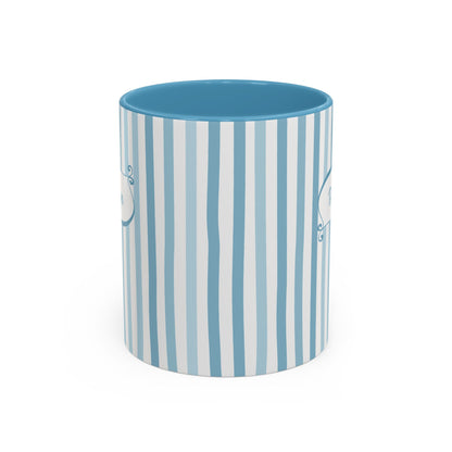 Side view of a 11oz mug with vertical light blue and white stripes, featuring a solid light blue interior and rim, shown on a clean white background. Handle not visible.