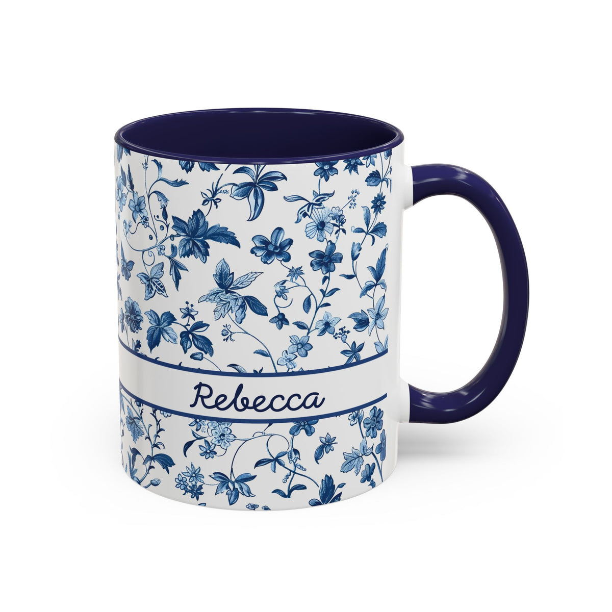 A white ceramic 11oz mug with a navy blue floral chinoiserie pattern, a navy blue handle and interior, and a white band around the middle featuring the name 'Samantha' in script. Right handle view.