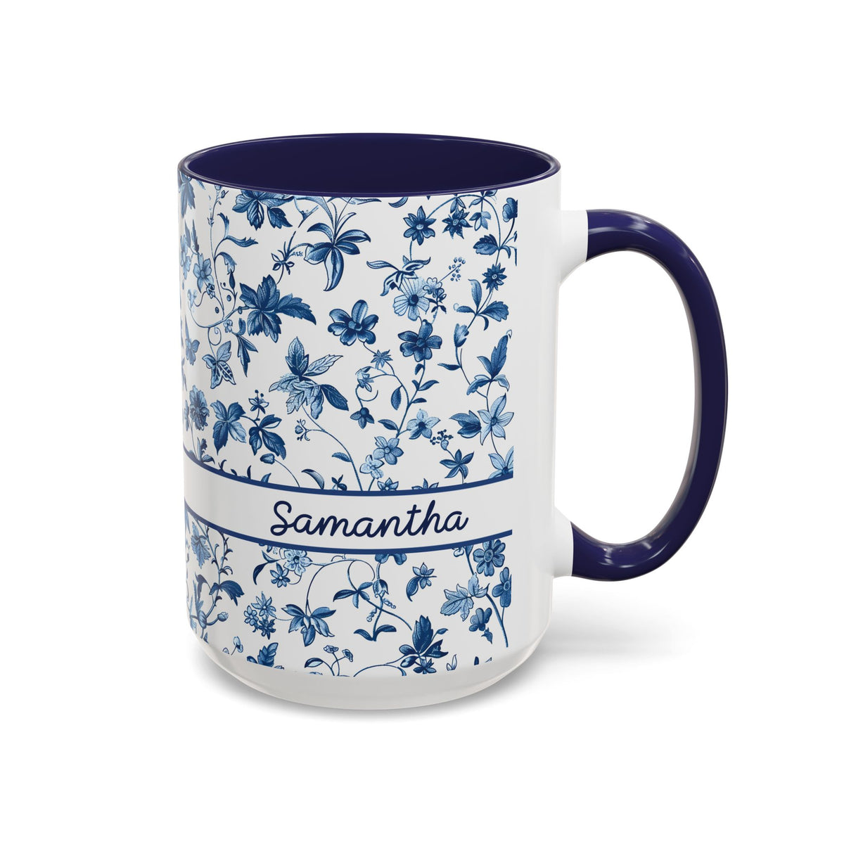 A white ceramic 15oz mug with a navy blue floral chinoiserie pattern, a navy blue handle and interior, and a white band around the middle featuring the name 'Samantha' in script. Right handle view.
