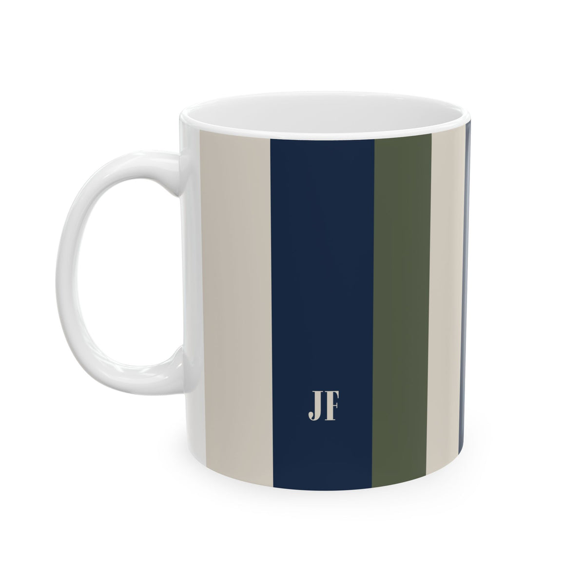 A white ceramic 11oz mug with vertical stripes in beige, navy blue, and olive green, featuring a white monogram 'JF' printed on the navy stripe. Left handle view.