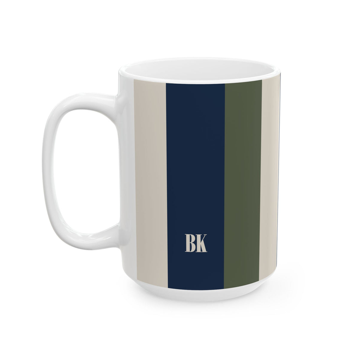 A white ceramic 15oz mug with wide vertical stripes in olive green, beige, and navy blue, featuring a beige monogram 'BK' on the navy stripe. Left handle view.