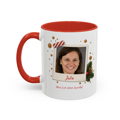A white ceramic 11oz mug with a red interior and red handle, featuring a custom printed holiday polaroid photo frame design with the name 'Brenda' and the text 'Nice List 2026 (mostly)'. Left handle view.
