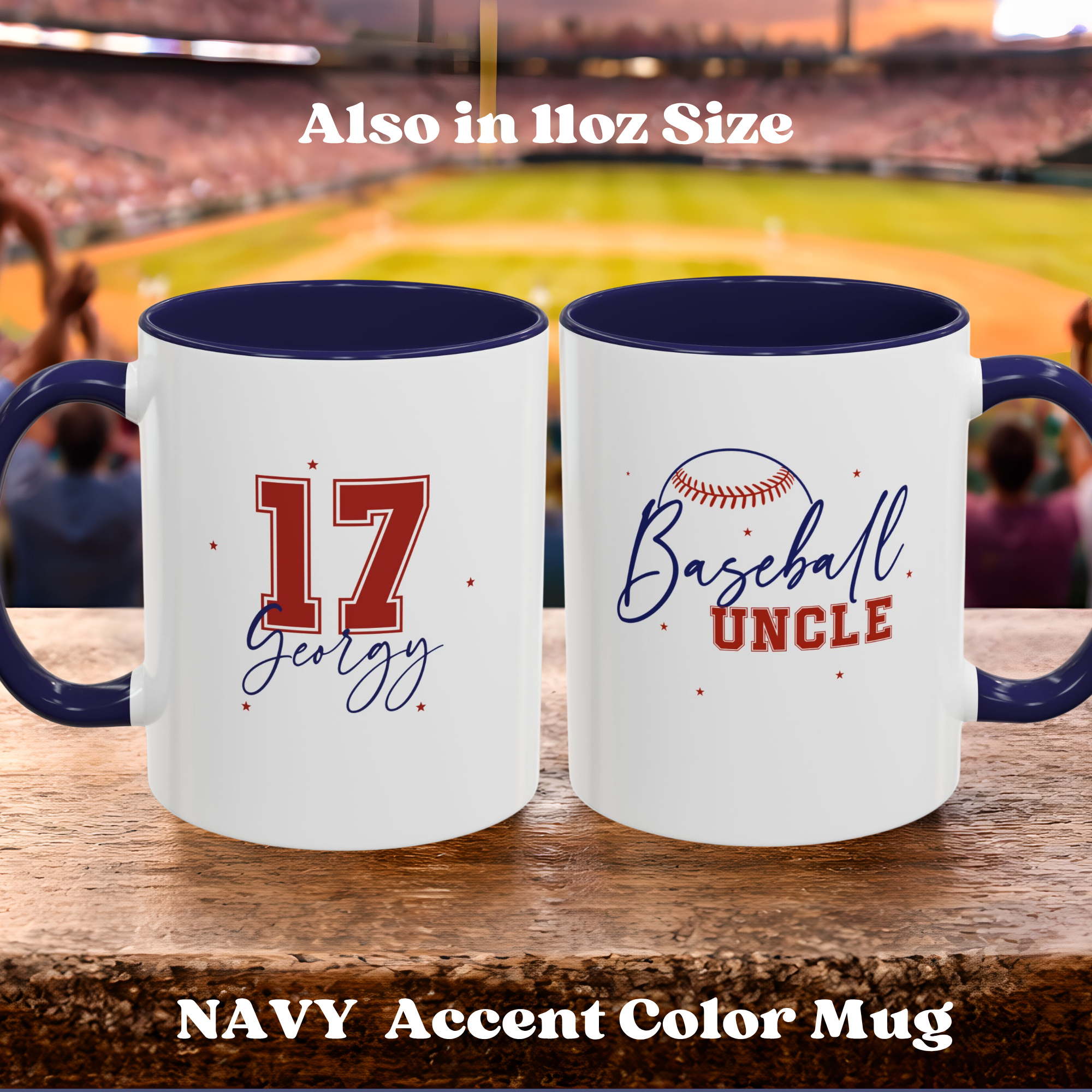 Two white ceramic baseball-themed mugs with navy blue interiors and handles, displayed side by side on a wooden surface with a blurred baseball stadium background. One mug features the number 17 and the name Georgy in red and navy script, and the other features a baseball graphic above the words 'Baseball Uncle' in navy and red.