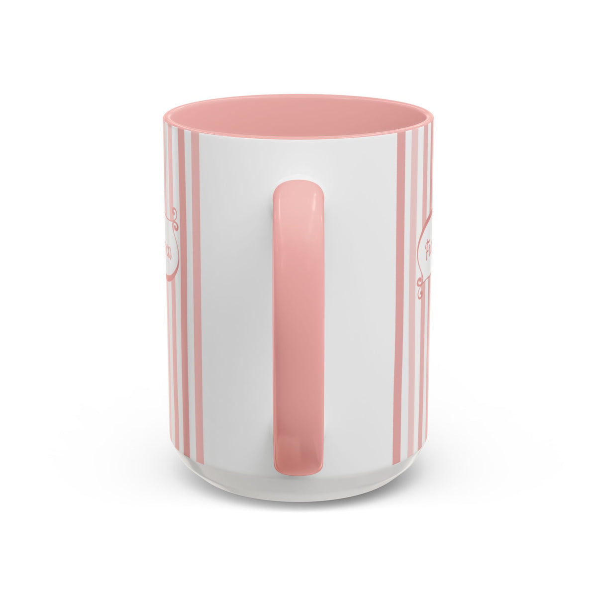 Handle view of a white ceramic 15oz mug with vertical pink and white stripes, a solid pink handle and interior, and a white base.