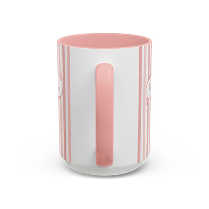 Handle view of a white ceramic 15oz mug with vertical pink and white stripes, a solid pink handle and interior, and a white base.