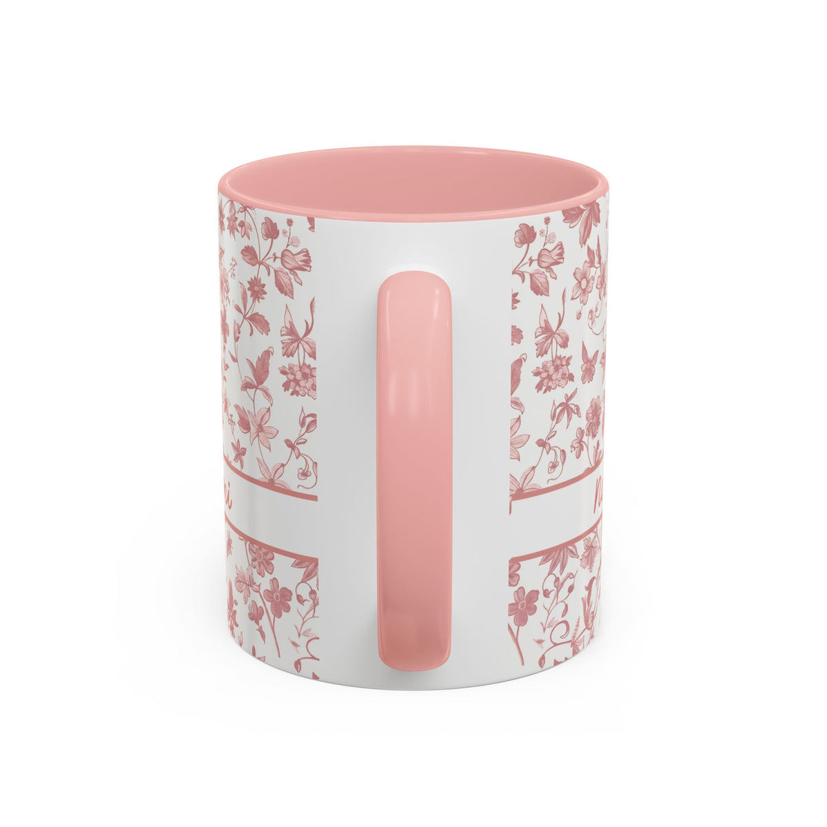 Handle view of a white ceramic 11oz mug with a pink floral chinoiserie pattern on the exterior and a solid pink interior and handle, shown on a clean white background.