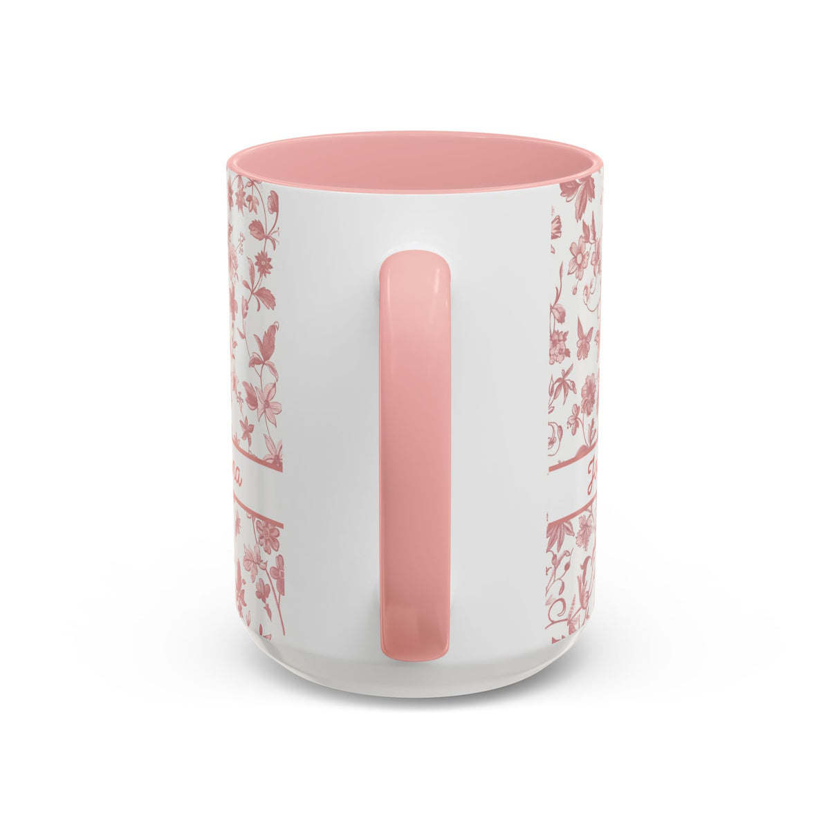 Handle view of a white ceramic 15oz mug with a pink floral chinoiserie pattern on the exterior and a solid pink interior and handle, shown on a clean white background.