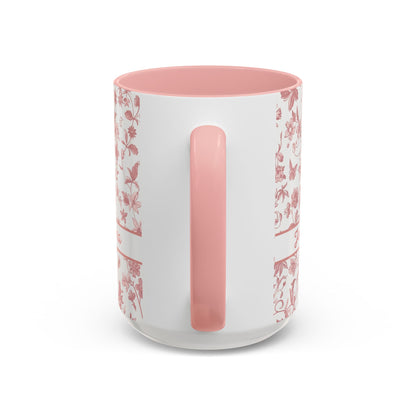Handle view of a white ceramic 15oz mug with a pink floral chinoiserie pattern on the exterior and a solid pink interior and handle, shown on a clean white background.