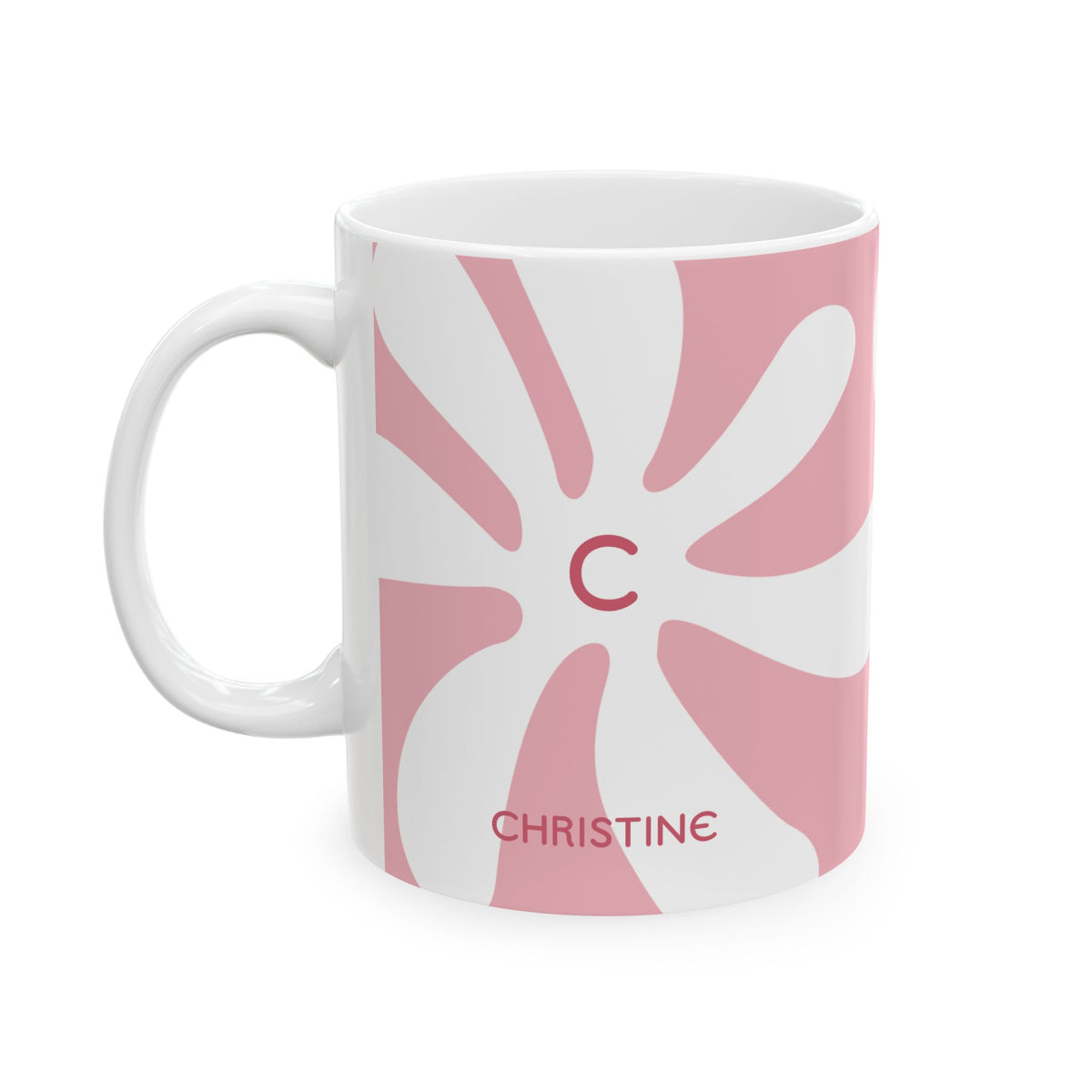 A white ceramic 11oz mug featuring a pink retro sunburst design with a red monogram letter 'C' in the center and the name 'CHRISTINE' printed in red near the bottom. Left handle view.
