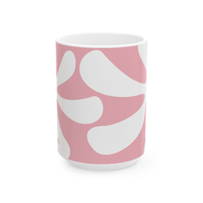 A white ceramic 11oz mug featuring a pink retro sunburst design. Side view, no handle visible.
