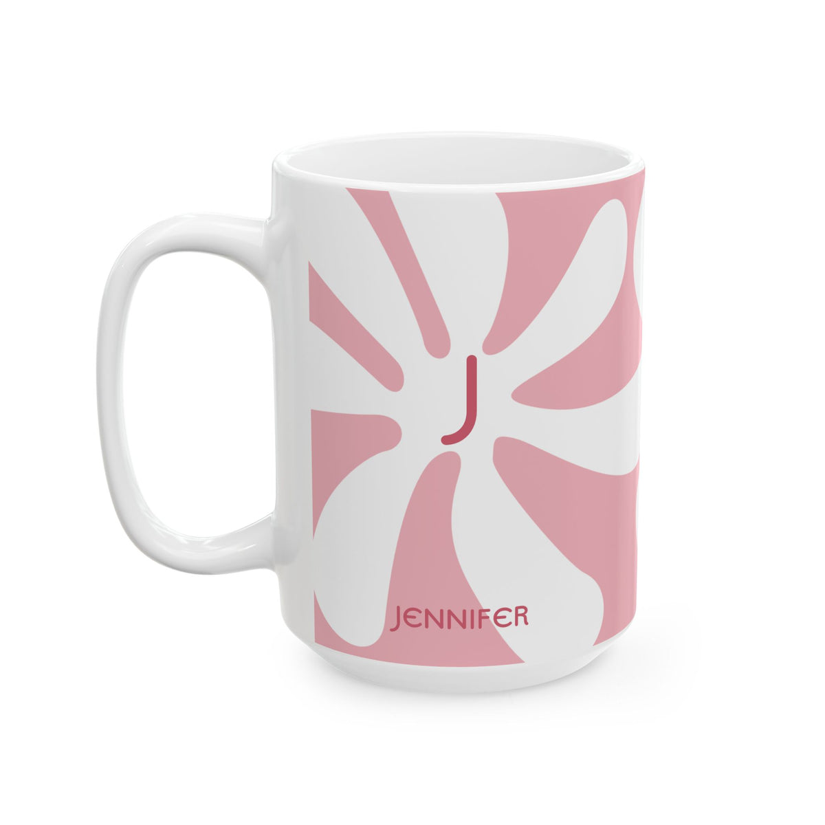 A white ceramic 15oz mug featuring a pink retro sunburst design with a red monogram letter 'J' in the center and the name 'JENNIFER' printed in red near the bottom. Left handle view.