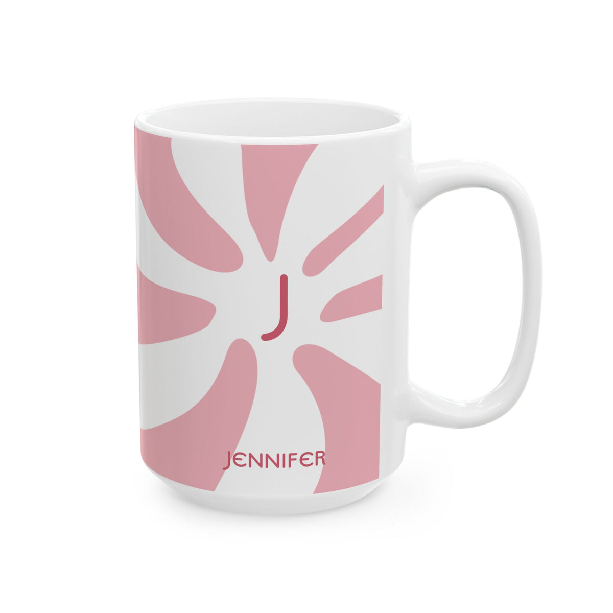A white ceramic 15oz mug featuring a pink retro sunburst design with a red monogram letter 'J' in the center and the name 'JENNIFER' printed in red near the bottom. Right handle view.