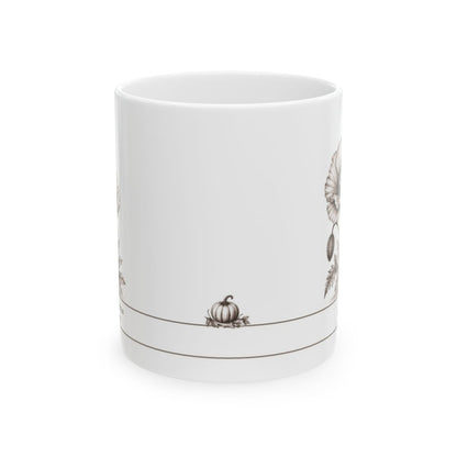 A white ceramic mug featuring a delicate brown illustration of a pumpkin and floral motifs, separated by thin horizontal lines, shown against a plain white background.