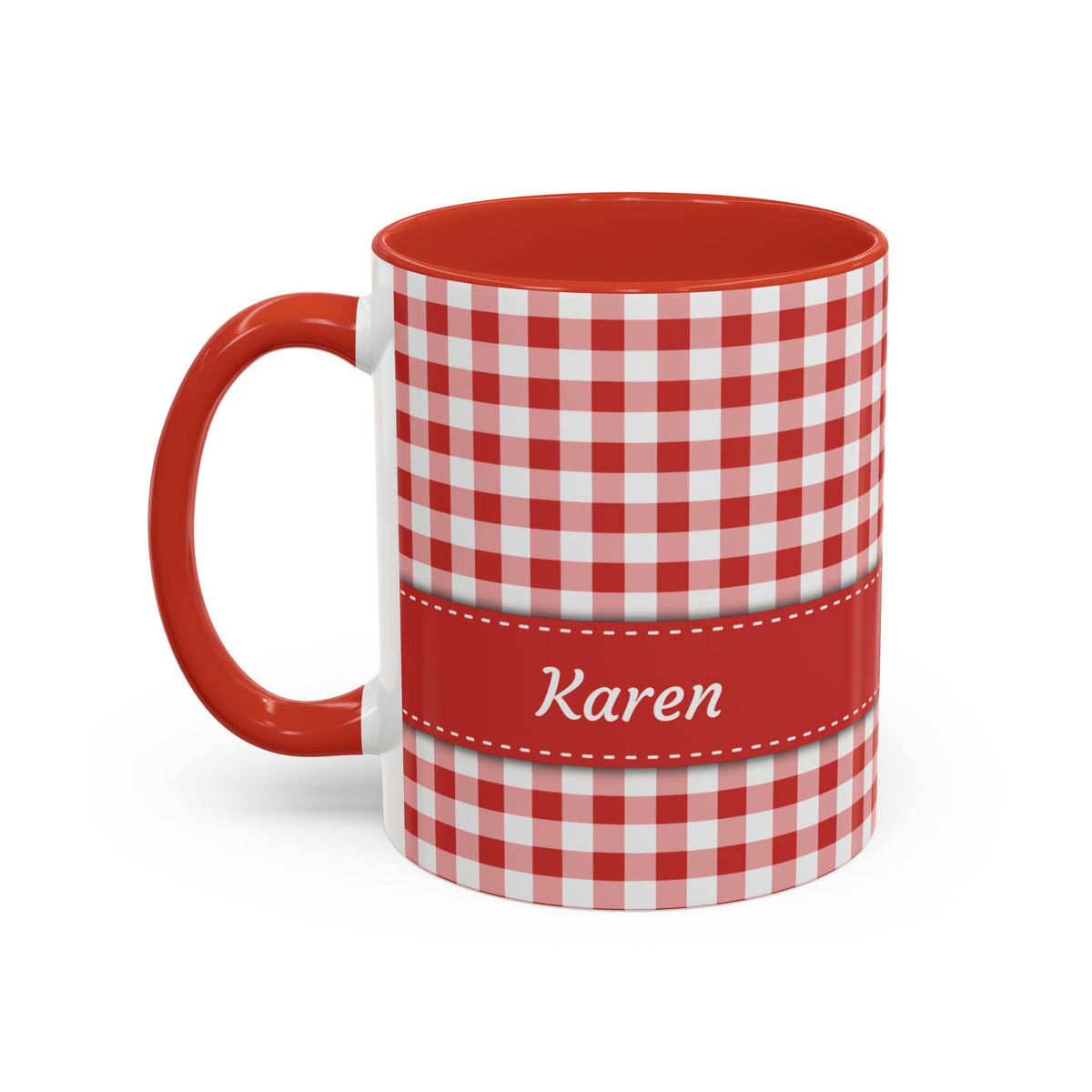 A white ceramic 11oz mug with a red and white gingham check pattern, a solid red handle and interior, and a red horizontal band around the middle featuring the name 'Rebecca' in white script. Left handle view.