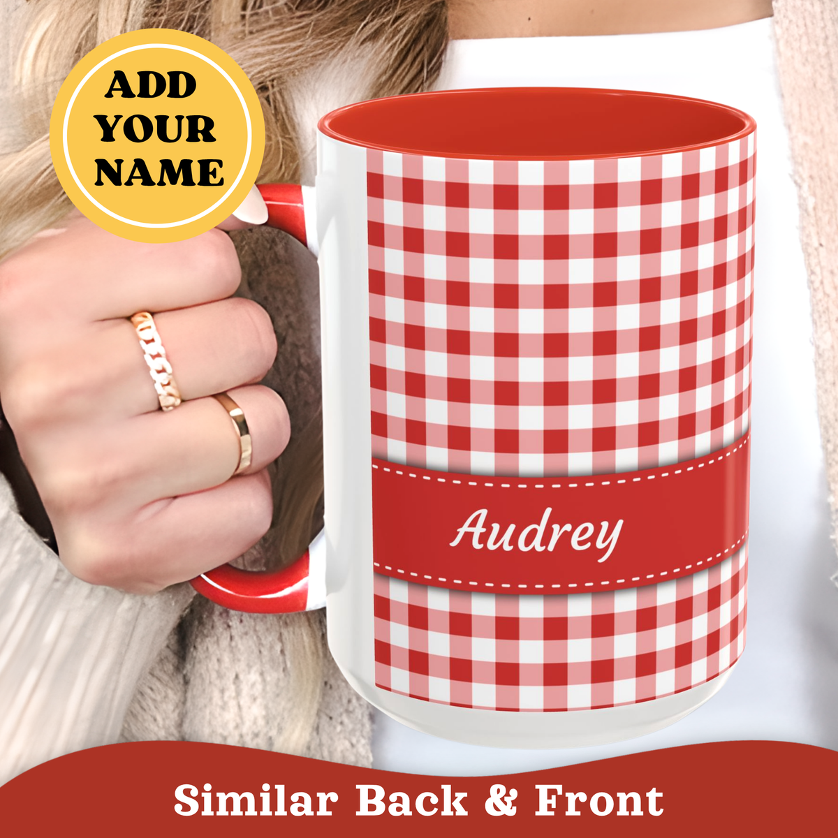 A person holds a white ceramic 15oz mug with a red and white gingham pattern and a red band printed with the name 'Audrey'. The image includes a yellow circular badge that says 'ADD YOUR NAME' and a red banner at the bottom reading 'Similar Back & Front'.
