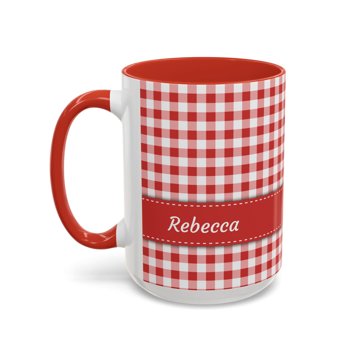 A white ceramic 15oz mug with a red and white gingham check pattern, a solid red handle and interior, and a red horizontal band around the middle featuring the name 'Rebecca' in white script. Left handle view.