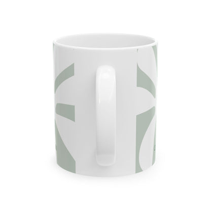 Handle view of a white ceramic 11oz mug with a minimalist sage green geometric pattern, shown from a side profile view against a plain white background.