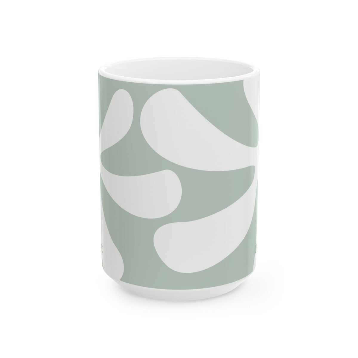 A white ceramic 15oz mug featuring a minimalist, abstract organic pattern in sage green and white, set against a clean white background. Handle not visible.