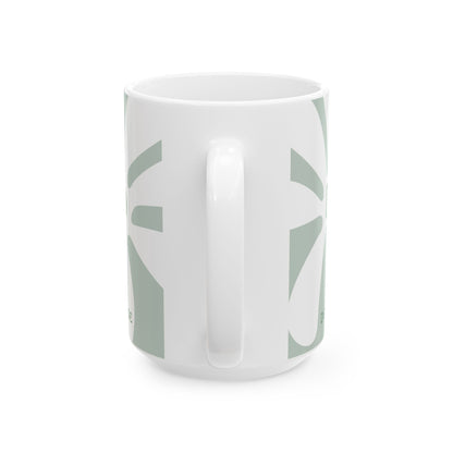 Handle view white ceramic 15oz coffee mug with a minimalist sage green geometric pattern, shown from a side angle on a clean white background.