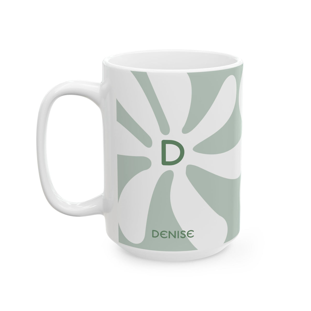 A white ceramic 15oz mug featuring a retro-inspired design with a sage green and white sunburst pattern, a green monogram letter 'D' in the center, and the name 'DENISE' printed near the bottom. Left handle view.