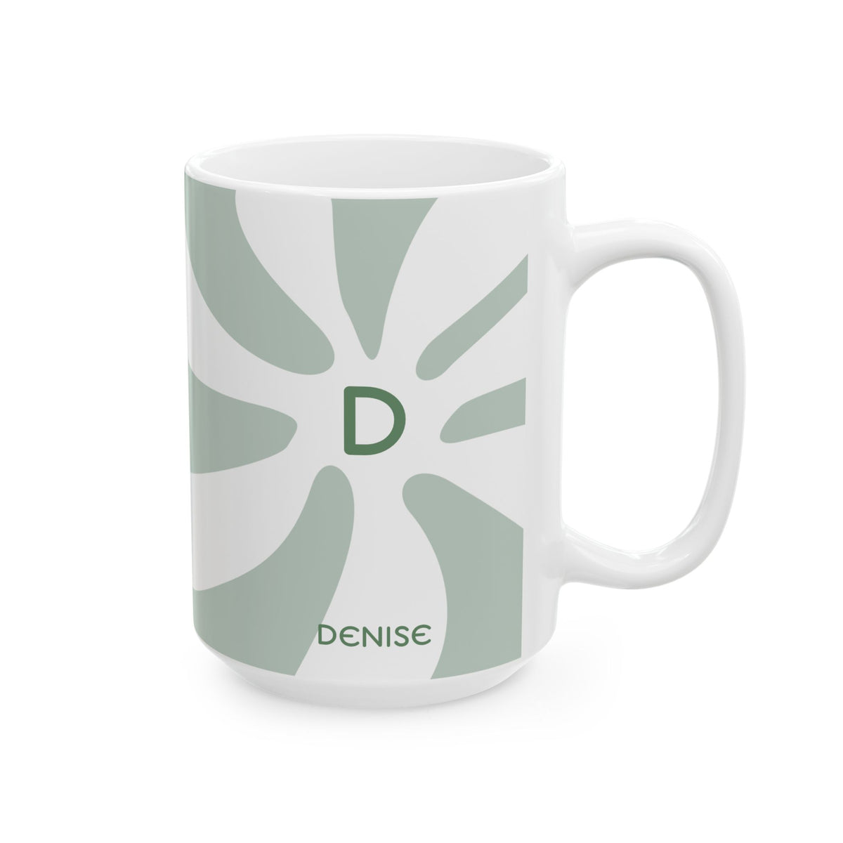 A white ceramic 15oz mug featuring a sage green sunburst design with a green monogram 'D' in the center and the name 'DENISE' printed near the bottom. Right handle view.