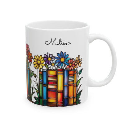 A white ceramic 11oz mug with a colorful stained-glass-style illustration of books and flowers, featuring the name 'Melissa' printed in black script near the top. Right handle view.