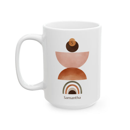 A white ceramic 15oz mug with a minimalist geometric stack design in terracotta, dusty pink, and brown, featuring the personalized name 'Samantha' and letter 'S' printed on it, set against a plain white background, left handle view.